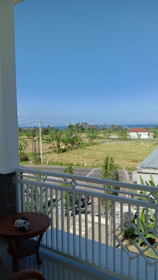 Limun Guesthouse Amlapura Buitenkant foto