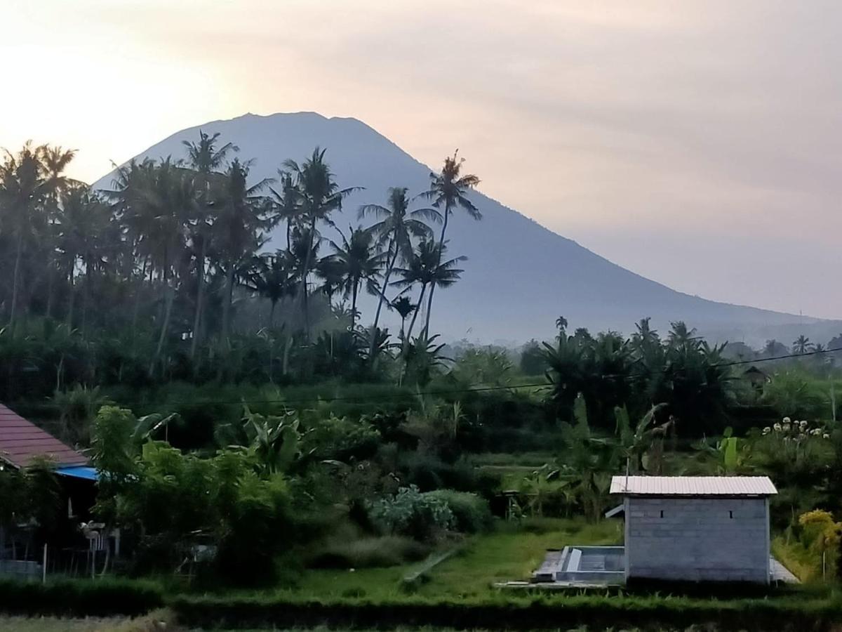 Limun Guesthouse Amlapura Buitenkant foto