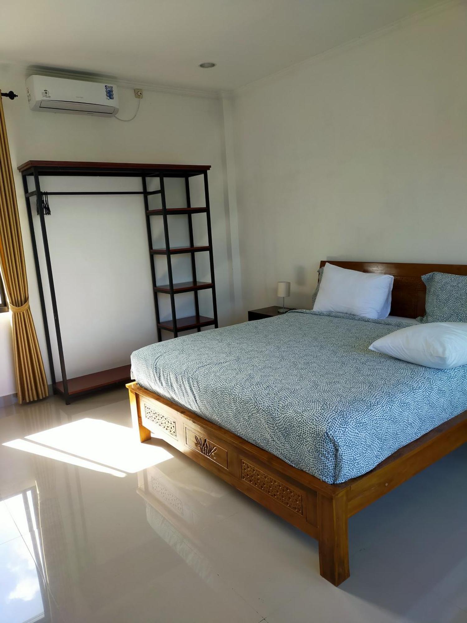 Limun Guesthouse Amlapura Buitenkant foto