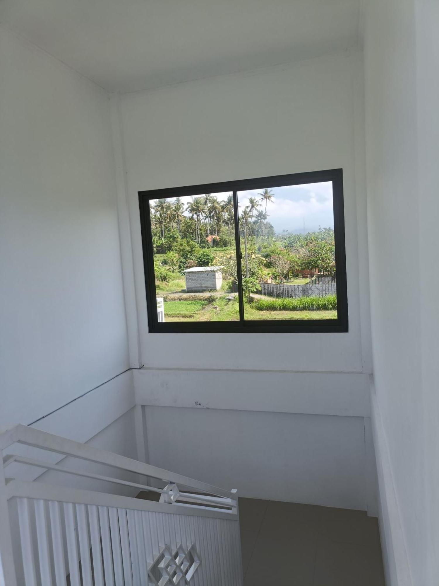Limun Guesthouse Amlapura Buitenkant foto